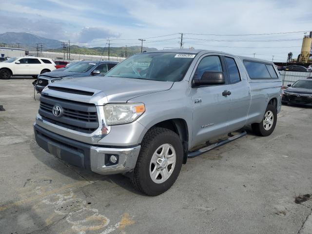TOYOTA TUNDRA DOU 2014 with VIN 5TFTY5F18EX008543 - Photo from auction