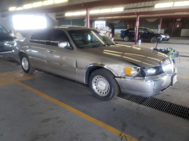 Photo 4 from auction – 2001 LINCOLN TOWN CAR E with VIN 1LNHM81WX1Y710773