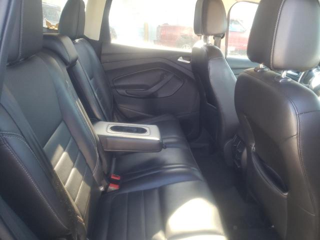 Photo 11 from auction – 2014 FORD ESCAPE TIT with VIN 1FMCU9J99EUD63928