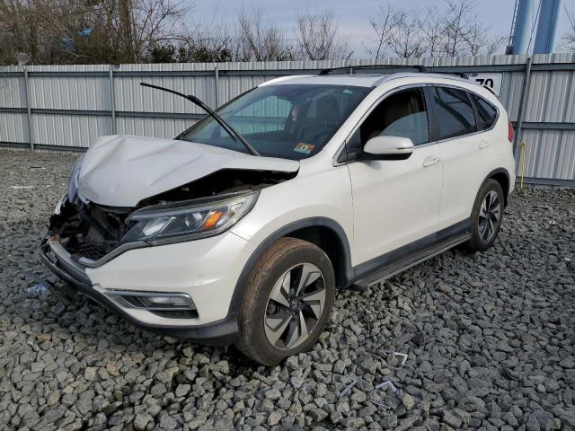 Photo 1 from auction – 2015 HONDA CR-V TOURI with VIN 5J6RM4H99FL076811