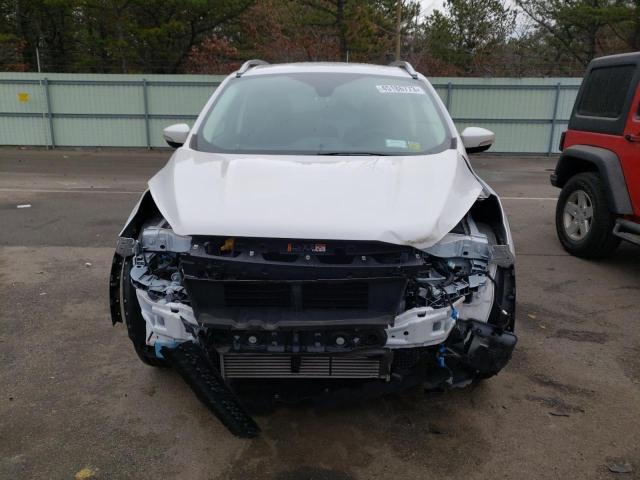 Photo 5 from auction – 2019 FORD ESCAPE with VIN 1FMCU9J94KUB91383