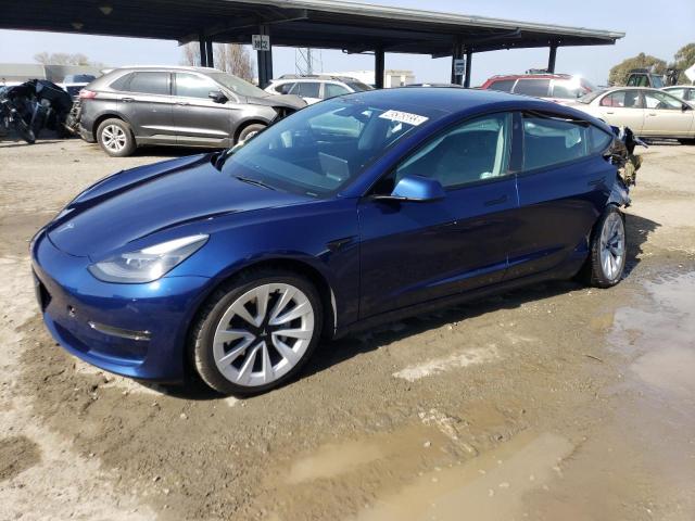 TESLA MODEL 3 2022 with VIN 5YJ3E1EA4NF143807 - Photo from auction