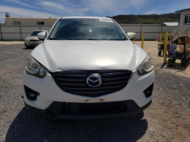 Photo 5 from auction – 2016 MAZDA CX-5 GT with VIN JM3KE2DY2G0665005