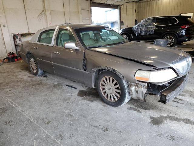 Photo 4 from auction – 2004 LINCOLN TOWN CAR E with VIN 1LNHM81W14Y652489