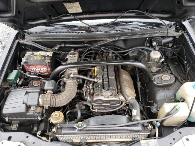 Photo 11 from auction – 2003 CHEVROLET TRACKER with VIN 2CNBE13C136900760