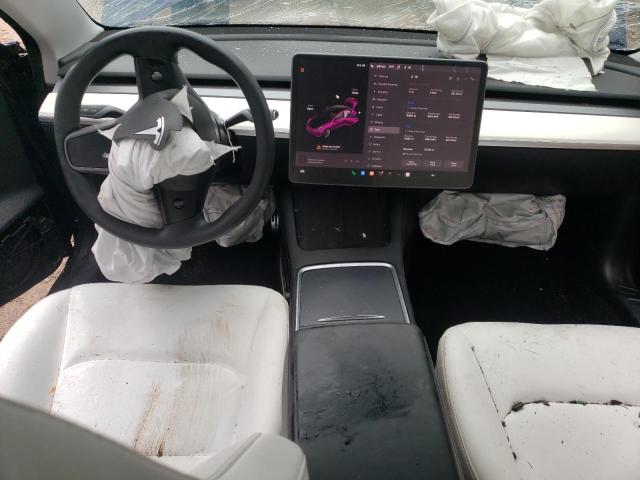 Photo 8 from auction – 2021 TESLA MODEL 3 with VIN 5YJ3E1EA5MF063091