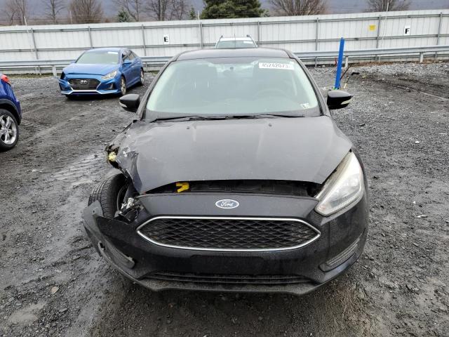 Photo 5 from auction – 2016 FORD FOCUS with VIN 1FADP3F24GL220182