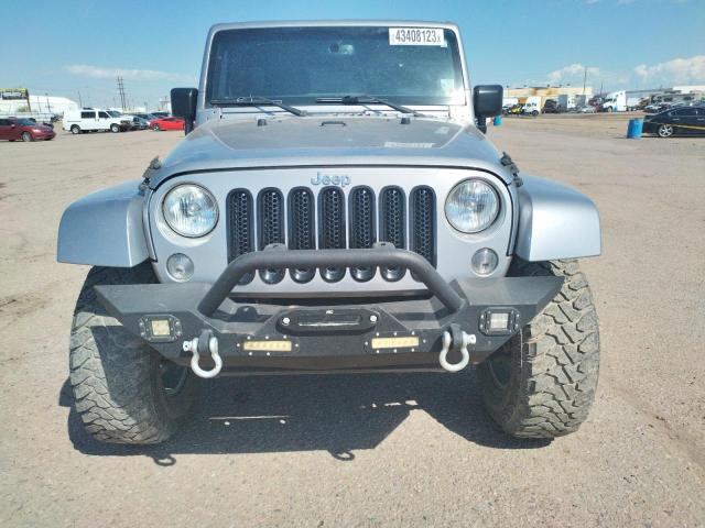 Photo 5 from auction – 2016 JEEP WRANGLER U with VIN 1C4BJWEG5GL148071