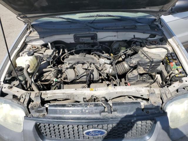 Photo 11 from auction – 2003 FORD ESCAPE XLS with VIN 1FMYU02173KA78857