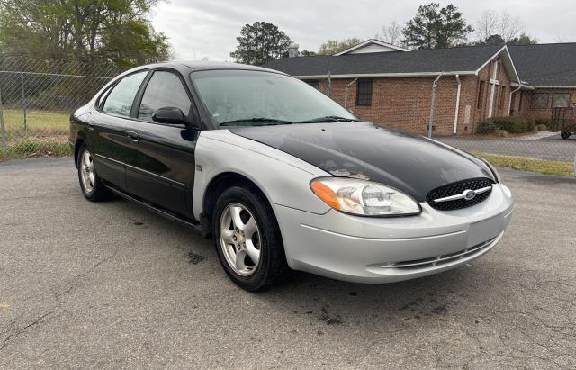 FORD TAURUS SES 2003 with VIN 1FAFP55UX3A136039 - Photo from auction