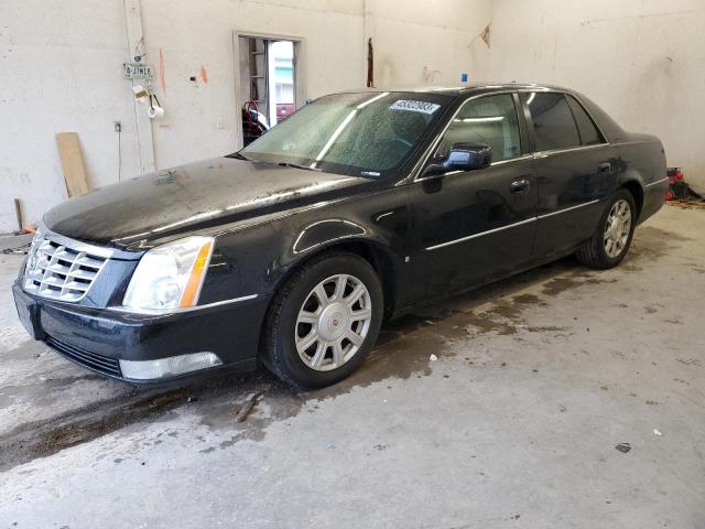 CADILLAC DTS 2010 with VIN 1G6KA5EYXAU100086 - Photo from auction