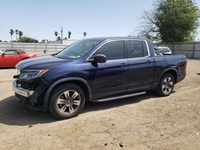 HONDA RIDGELINE 2018 with VIN 5FPYK2F6XJB003275 - Photo from auction