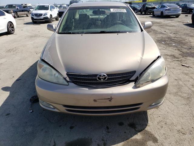 Photo 5 from auction – 2004 TOYOTA CAMRY LE with VIN 4T1BE30K84U857786