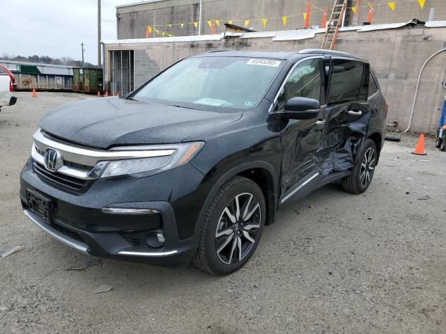 HONDA PILOT TOUR 2021 with VIN 5FNYF6H97MB009941 - Photo from auction