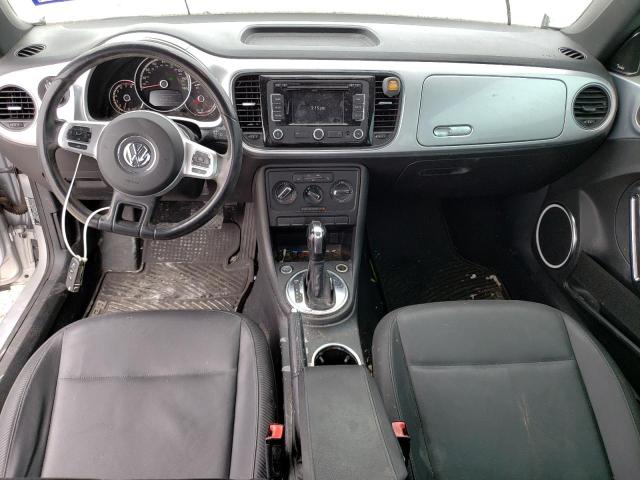 Photo 8 from auction – 2013 VOLKSWAGEN BEETLE with VIN 3VWJX7AT1DM677754