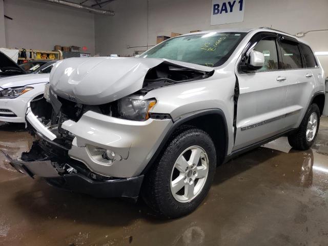 JEEP GRAND CHER 2011 with VIN 1J4RR4GG8BC694018 - Photo from auction
