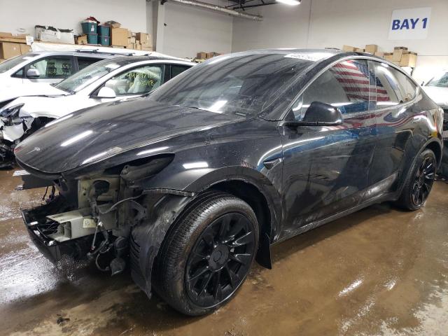 TESLA MODEL Y 2022 with VIN 7SAYGDEEXNF427143 - Photo from auction