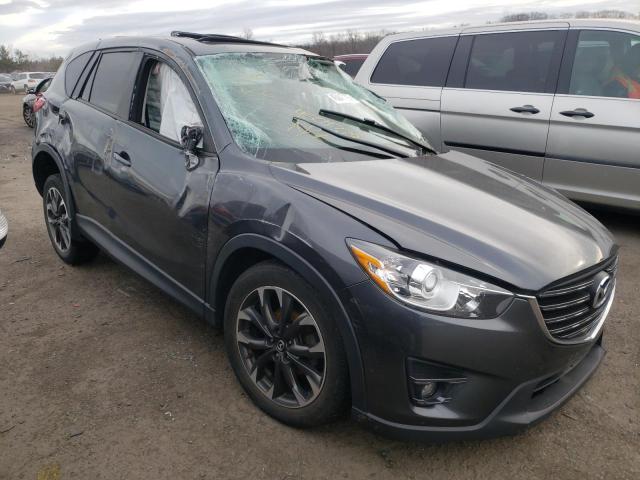 Photo 4 from auction – 2016 MAZDA CX-5 GT with VIN JM3KE4DY0G0900934