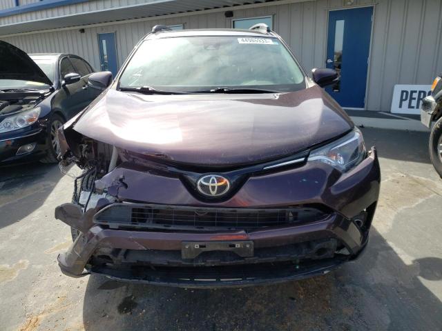 Photo 5 from auction – 2017 TOYOTA RAV4 XLE with VIN 2T3RFREV5HW657916