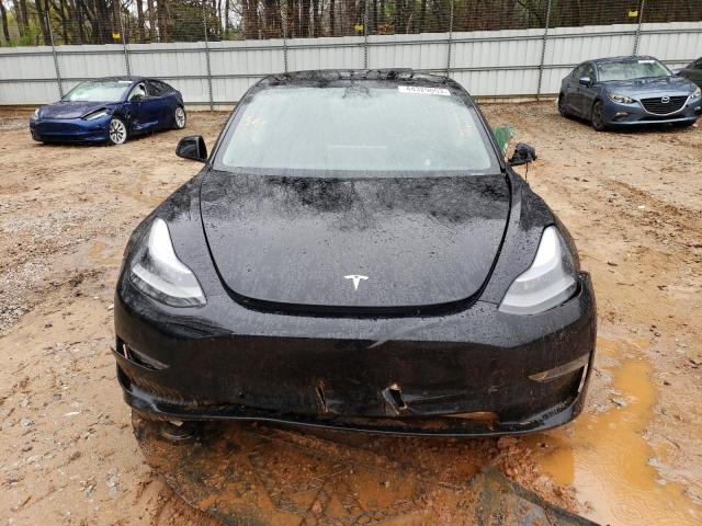 Photo 5 from auction – 2021 TESLA MODEL 3 with VIN 5YJ3E1EA0MF042990