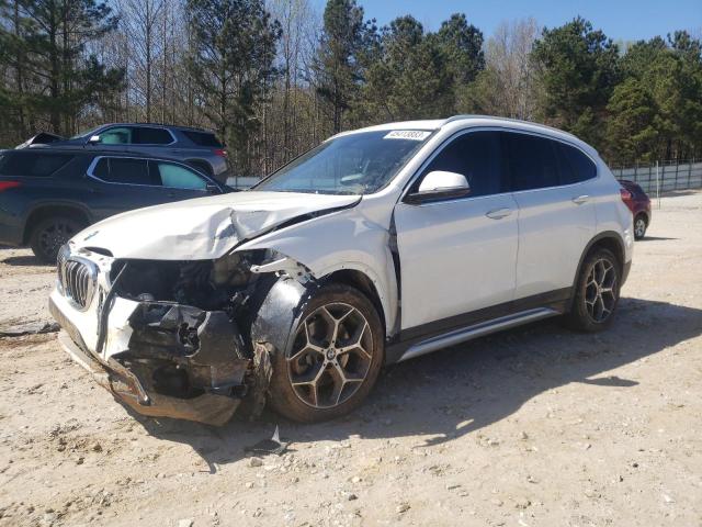 BMW X1 XDRIVE2 2018 with VIN WBXHT3C31J5L31971 - Photo from auction