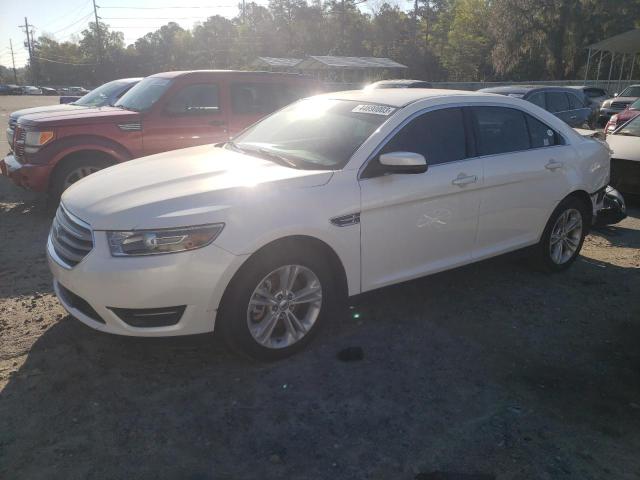 FORD TAURUS SEL 2017 with VIN 1FAHP2E84HG120577 - Photo from auction