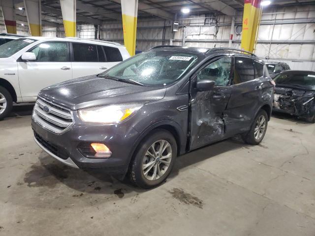 FORD ESCAPE SE 2018 with VIN 1FMCU9GD9JUB29052 - Photo from auction