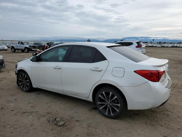 Photo 2 from auction – 2017 TOYOTA COROLLA L with VIN 5YFBURHE0HP677651