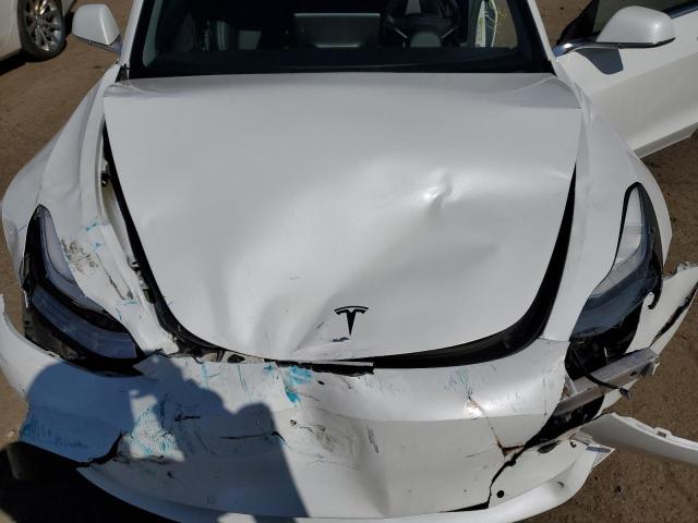 Photo 11 from auction – 2018 TESLA MODEL 3 with VIN 5YJ3E1EB7JF134070