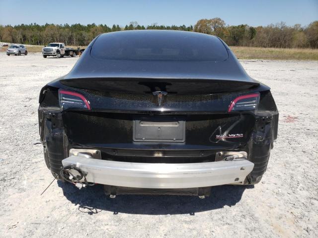 Photo 6 from auction – 2021 TESLA MODEL 3 with VIN 5YJ3E1EC7MF036993
