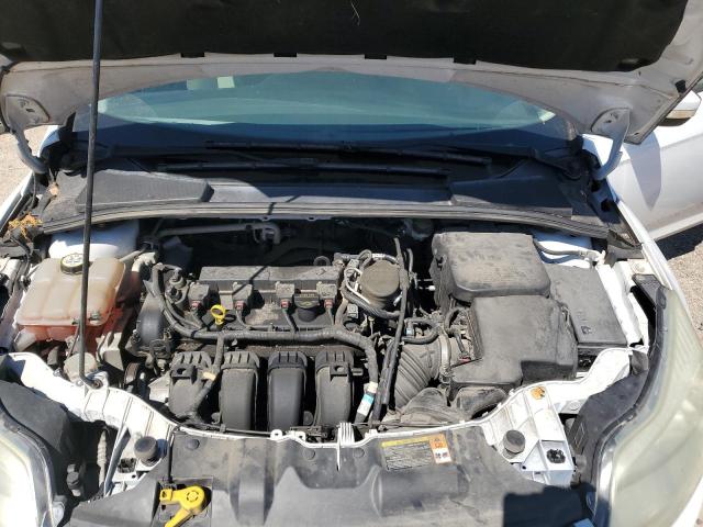 Photo 11 from auction – 2013 FORD FOCUS SE with VIN 1FADP3F23DL231055