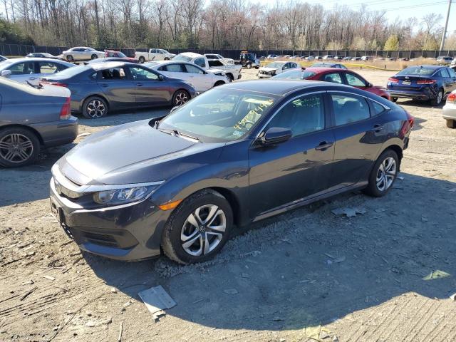 HONDA CIVIC LX 2018 with VIN 19XFC2F57JE044313 - Photo from auction