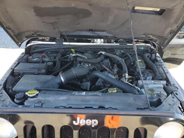 Photo 11 from auction – 2011 JEEP WRANGLER U with VIN 1J4BA5H18BL615276