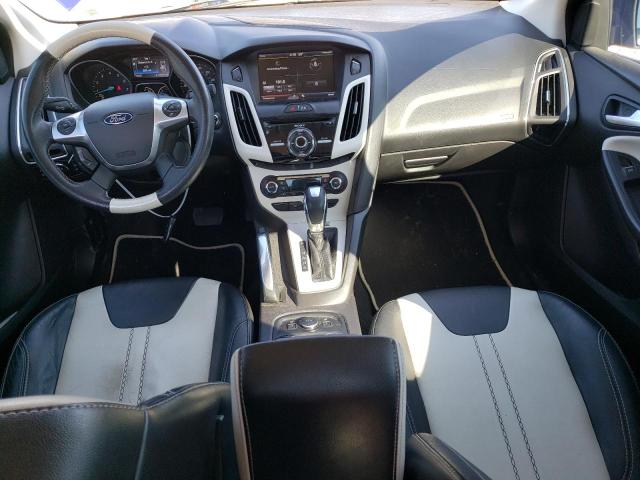 Photo 8 from auction – 2014 FORD FOCUS TITA with VIN 1FADP3J22EL158673