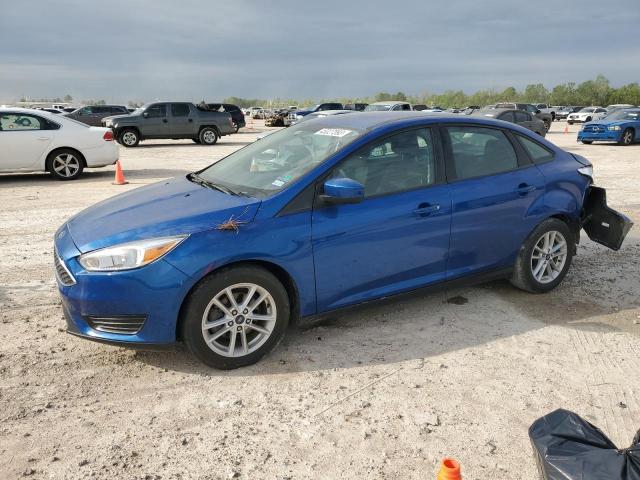 FORD FOCUS SE 2018 with VIN 1FADP3FE7JL229234 - Photo from auction