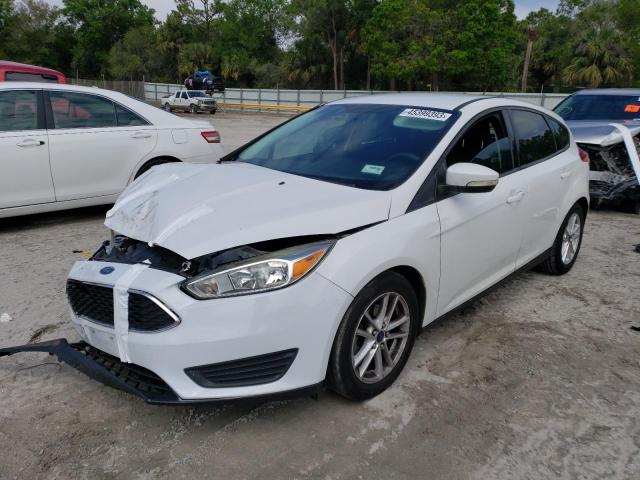 FORD FOCUS SE 2015 with VIN 1FADP3K28FL301335 - Photo from auction
