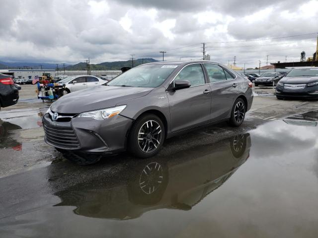 TOYOTA CAMRY HYBR 2016 with VIN 4T1BD1FK5GU197872 - Photo from auction
