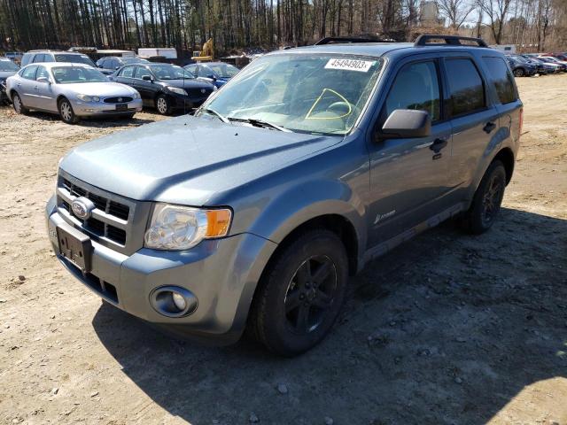 FORD ESCAPE HYB 2011 with VIN 1FMCU5K35BKC69720 - Photo from auction