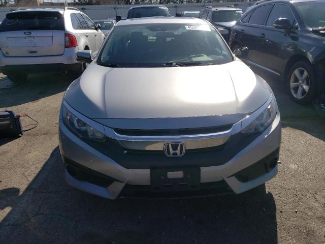Photo 5 from auction – 2018 HONDA CIVIC EX with VIN 19XFC2F81JE009857