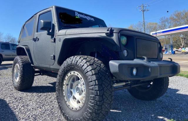 JEEP WRANGLER S 2011 with VIN 1J4AA2D11BL630380 - Photo from auction