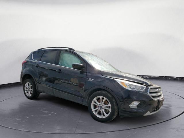 Photo 4 from auction – 2019 FORD ESCAPE SEL with VIN 1FMCU9HD7KUB66732