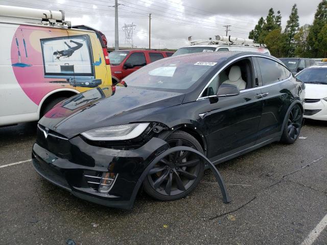 TESLA MODEL X 2018 with VIN 5YJXCBE29JF102878 - Photo from auction