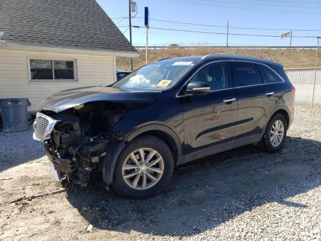 KIA SORENTO LX 2016 with VIN 5XYPGDA3XGG026054 - Photo from auction