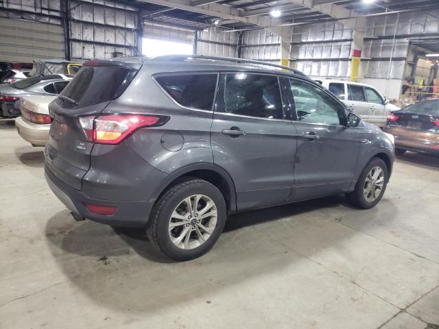 Photo 3 from auction – 2018 FORD ESCAPE SE with VIN 1FMCU9GD9JUB29052