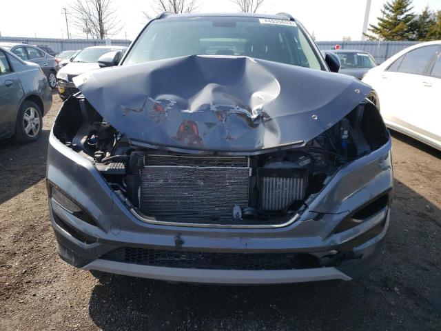 Photo 5 from auction – 2017 HYUNDAI TUCSON LIM with VIN KM8J3CA29HU488118