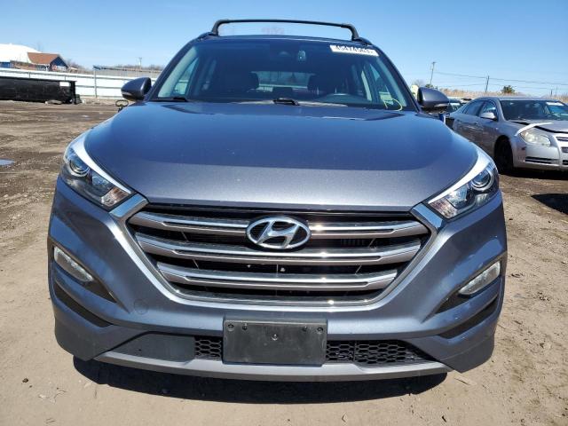 Photo 5 from auction – 2016 HYUNDAI TUCSON LIM with VIN KM8J3CA25GU208290