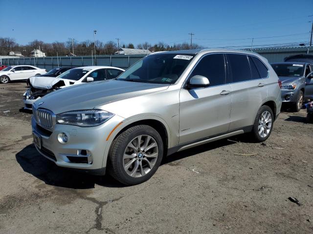 BMW X5 XDRIVE5 2014 with VIN 5UXKR6C51E0J72293 - Photo from auction