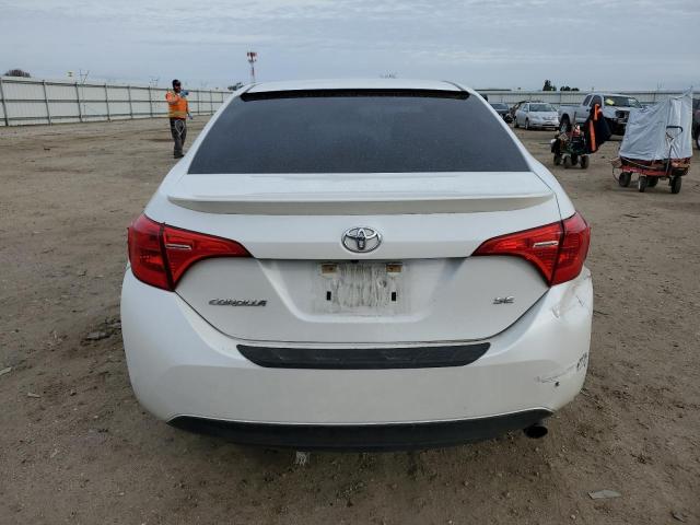Photo 6 from auction – 2017 TOYOTA COROLLA L with VIN 5YFBURHE0HP677651