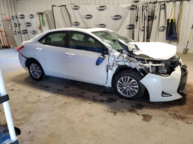 Photo 4 from auction – 2018 TOYOTA COROLLA LE with VIN 5YFBPRHE4JP763414