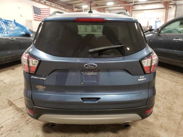 Photo 6 from auction – 2018 FORD ESCAPE SE with VIN 1FMCU9GD8JUA53257